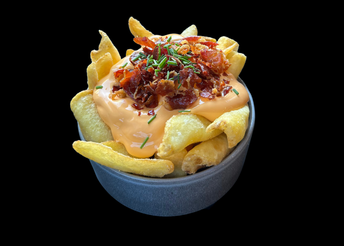 Patatas chédar con jamón crujiente